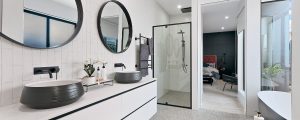 Beautiful white and black master bathroom in Display Home by Virtue Homes
