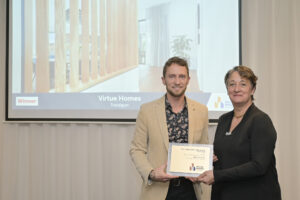 Virtue Homes Mick Nicola presented with award at Master Builders awards night 2022