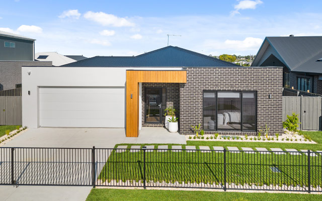 Facade of The Kingston Display Home in Traralgon, a single storey brick home
