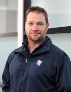 Photo of Mick Hogben from Virtue Homes wearing dark blue jacket